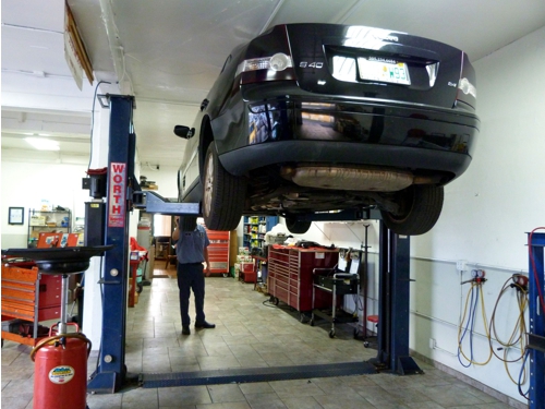a-European-auto-mechanic-servicing-a-volvo personal car
